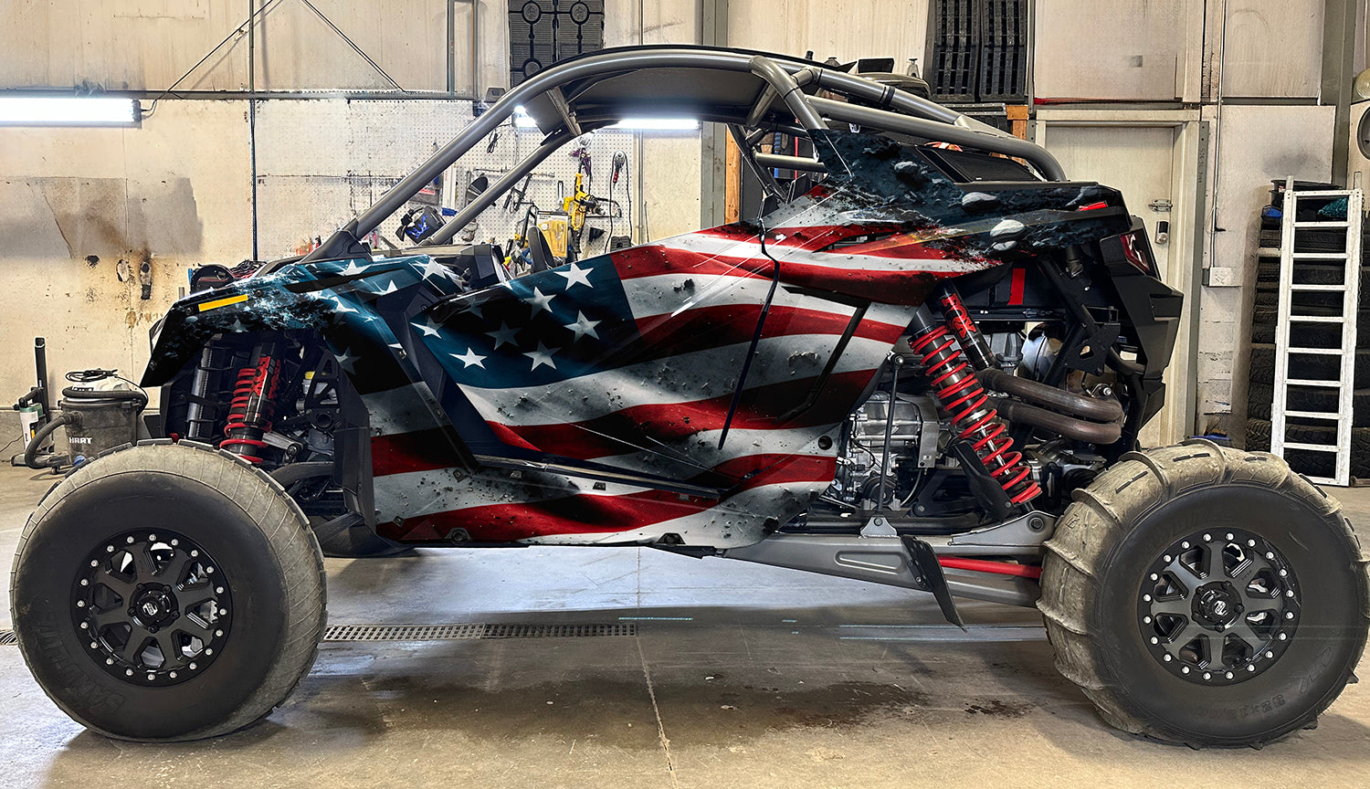 Side profile of Polaris Pro R 2 seater with full American flag wrap kit design