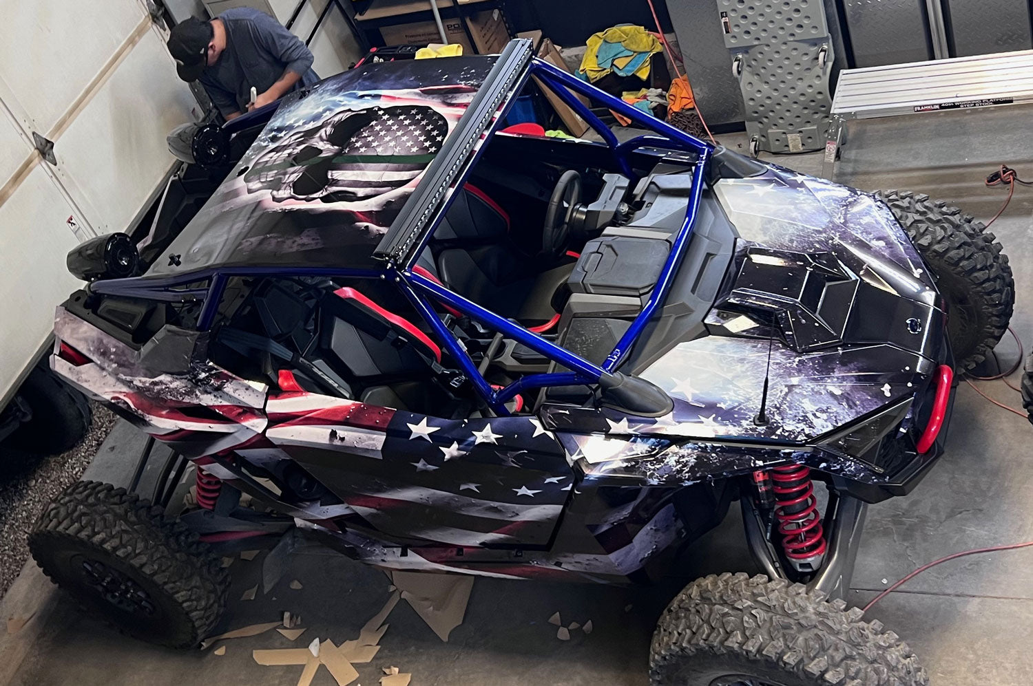 Polaris Pro R 2 seater hood wrap with skull and thin green line American flag